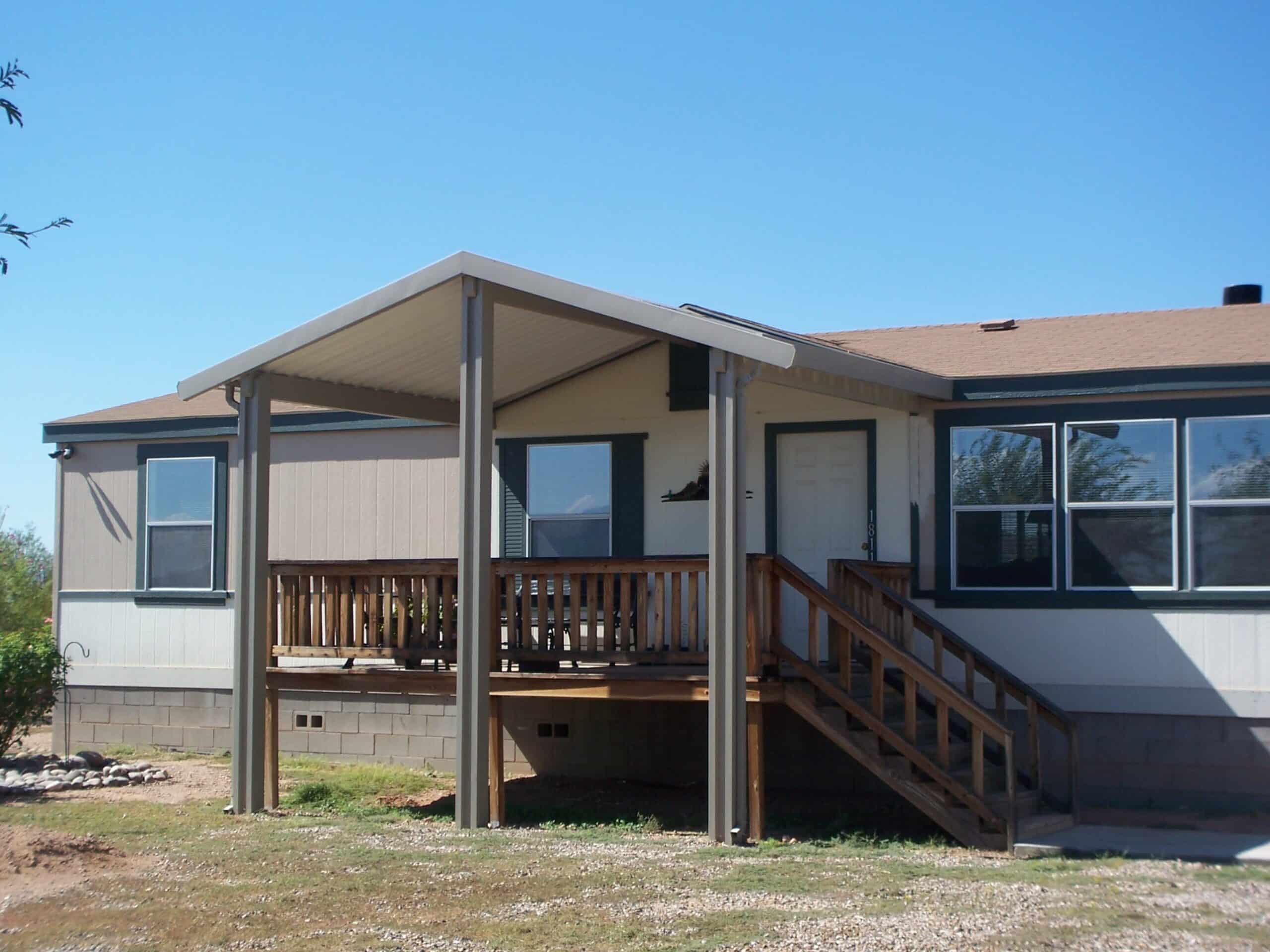 W-pan aluminum attached awning shading the entrance of a mobile home in Tucson, AZ