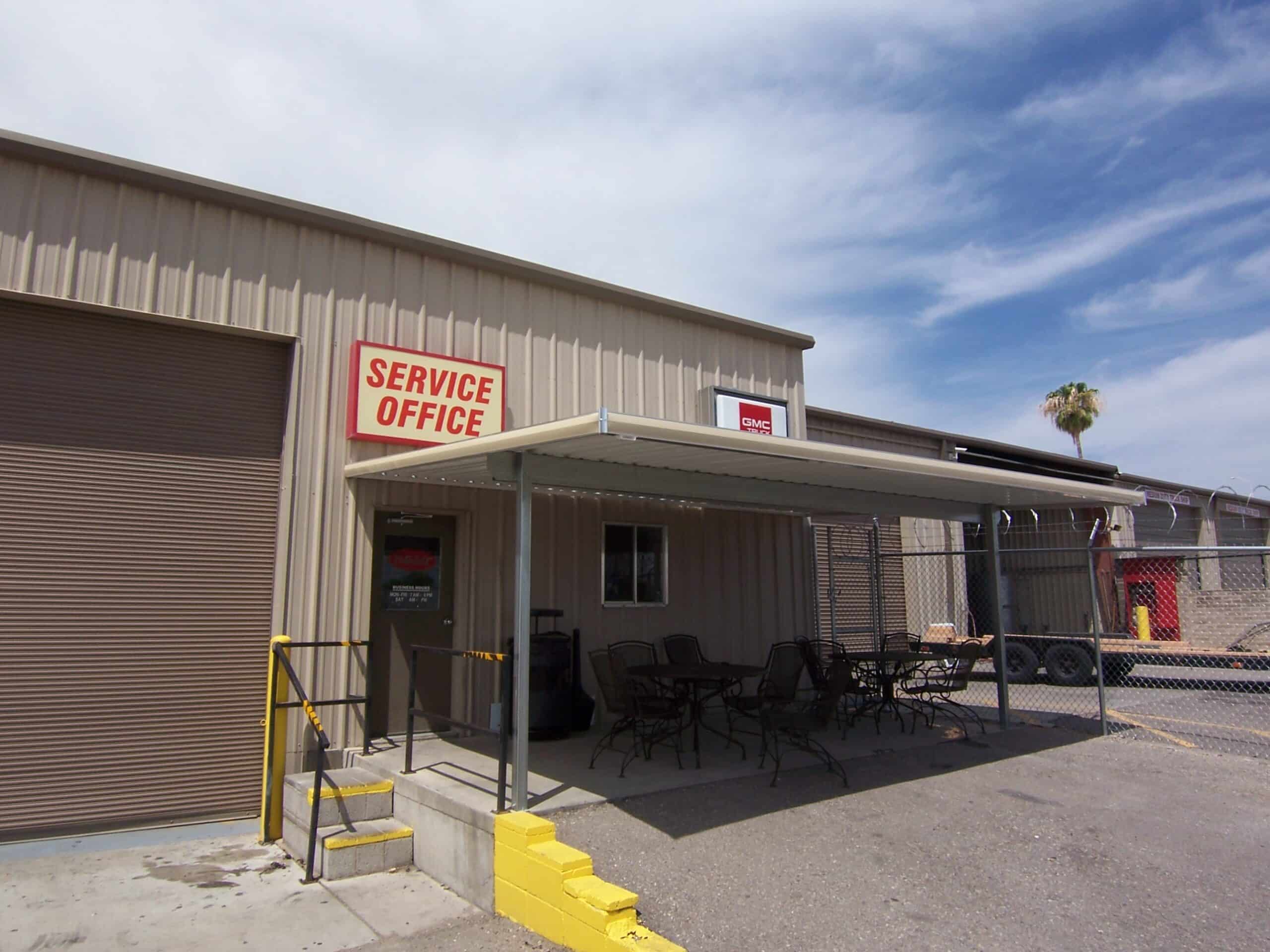 Aluminum awning providing employee shade outside a commercial building in Tucson, AZ