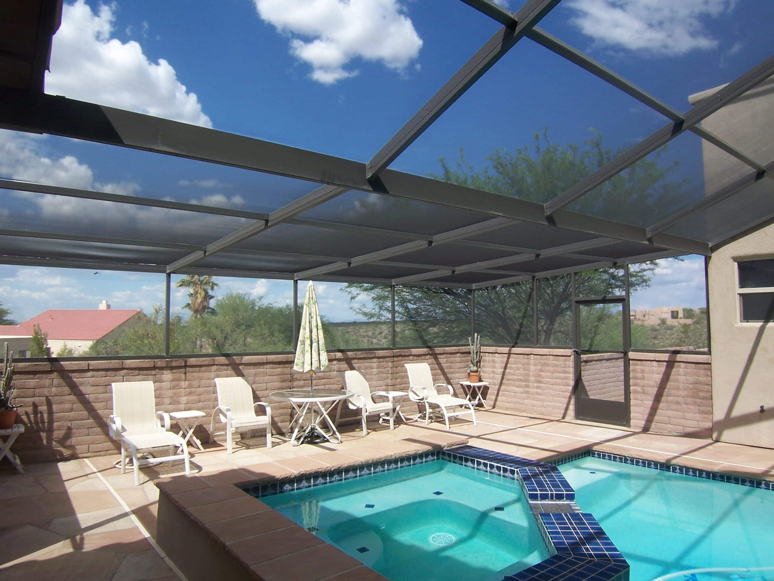 Aluminum-framed enclosure covering a pool area at a Tucson, AZ home